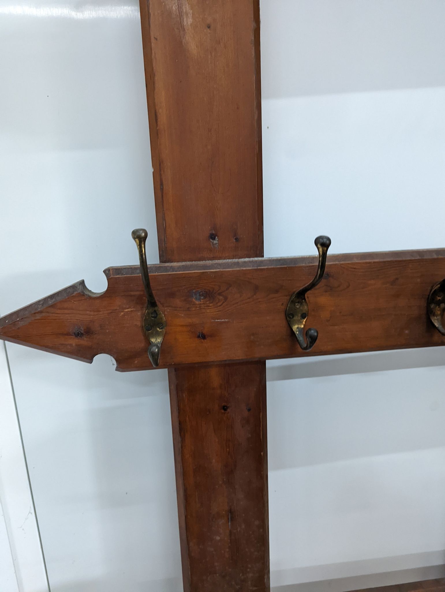 A late Victorian pitch pine hall stand, width 98cm, height 240cm